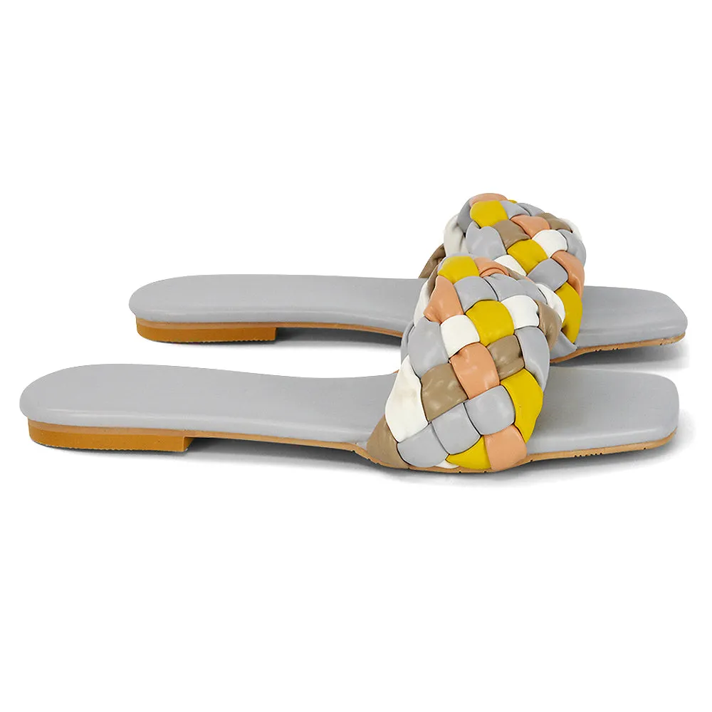 DARCIE WOVEN STRAP SQUARE TOE FLAT SLIDER SANDAL IN BLUE MULTI SYNTHETIC LEATHER